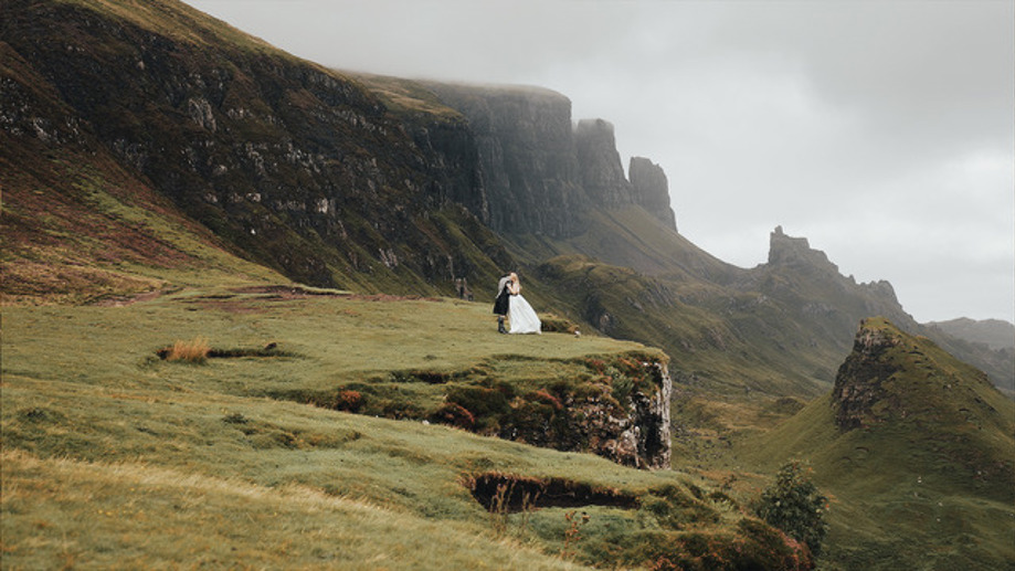 Bride and groom in hills