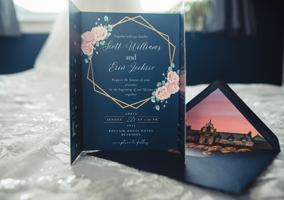 Navy gatefold wedding invitations with navy envelope liner of Boclair House at sunset