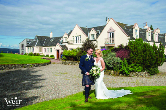 Bride and groom in gardens of Ardoch Loch Lomond by Weir Photography